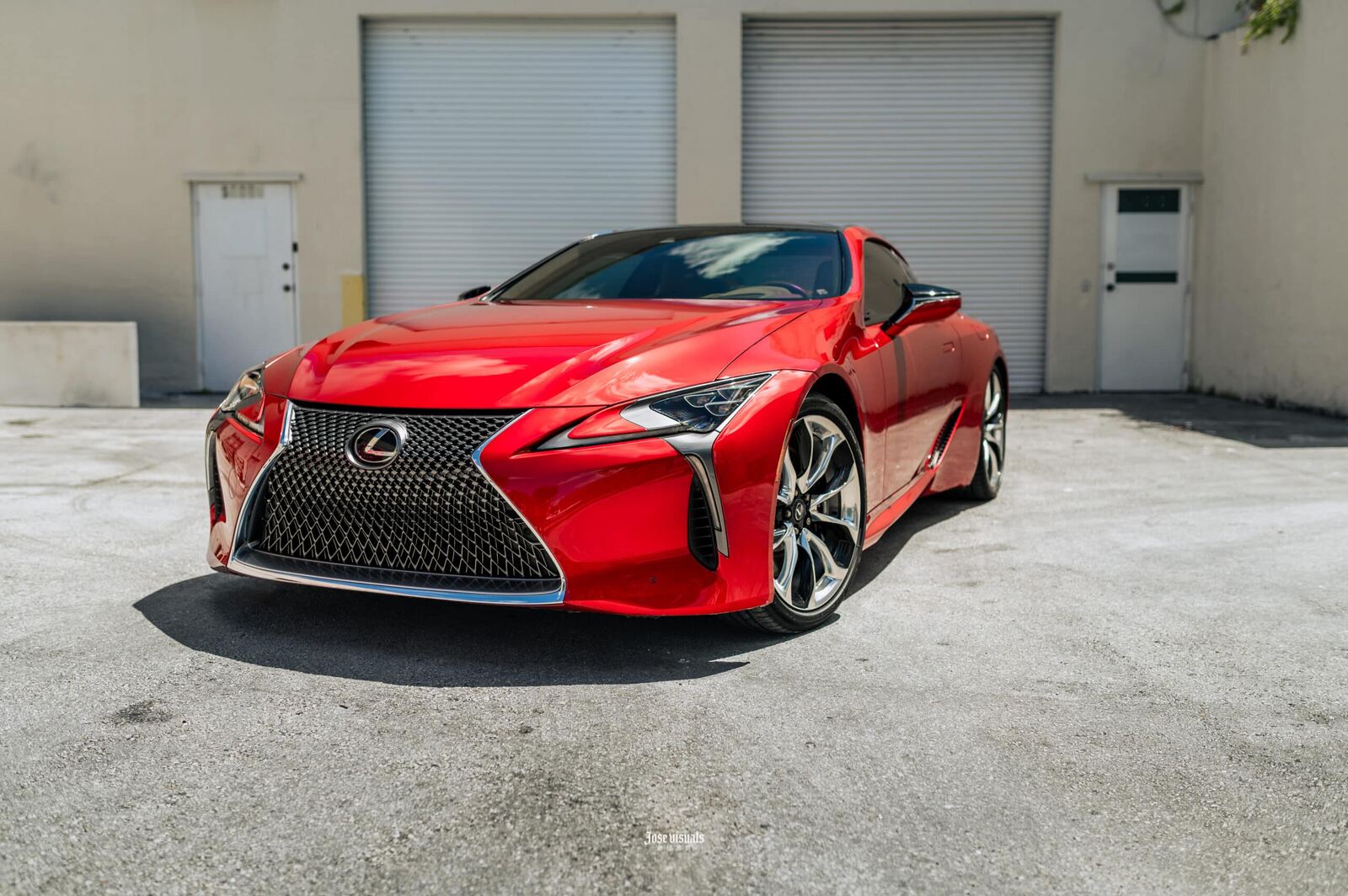 Red Lexus LC outside the studio